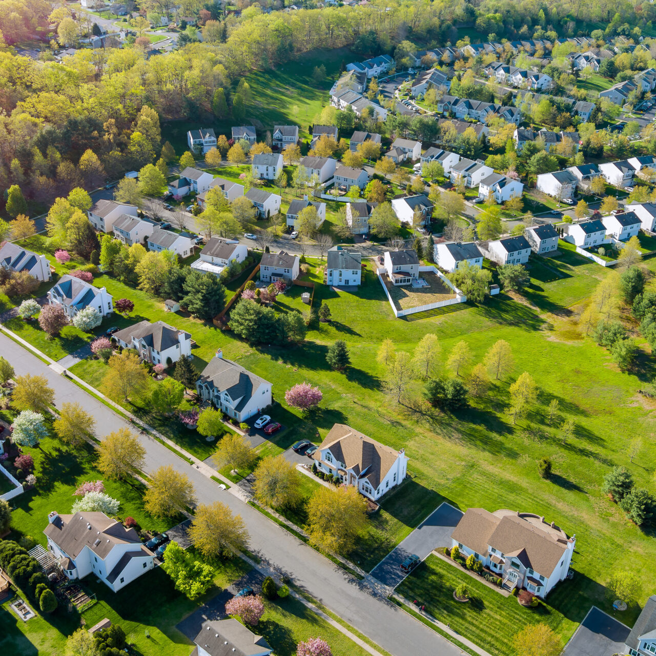 Aerial View Of Residential Houses Neighborhood Complex At Suburban Housing Development