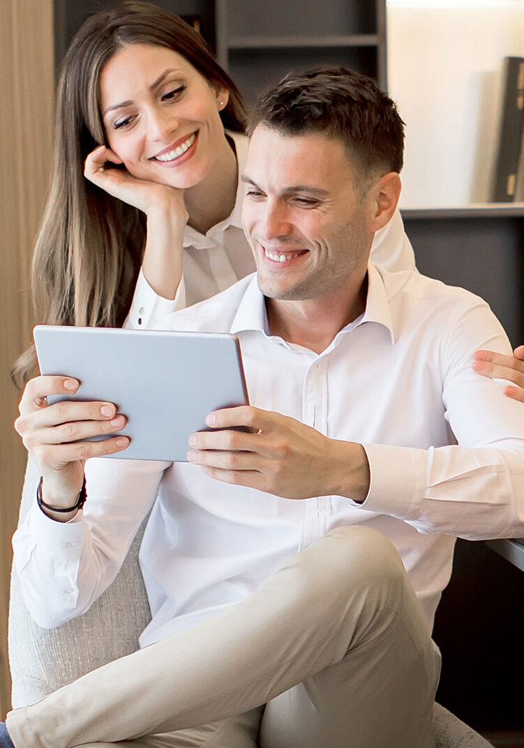 Happy Couple On Tablet